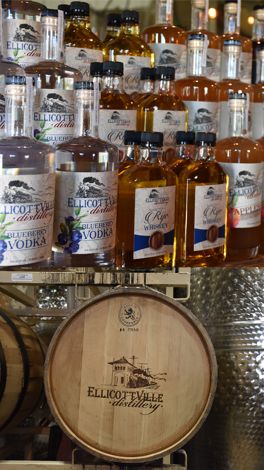 Collage from Ellicottville Distillery barrels and bottles of local spirits